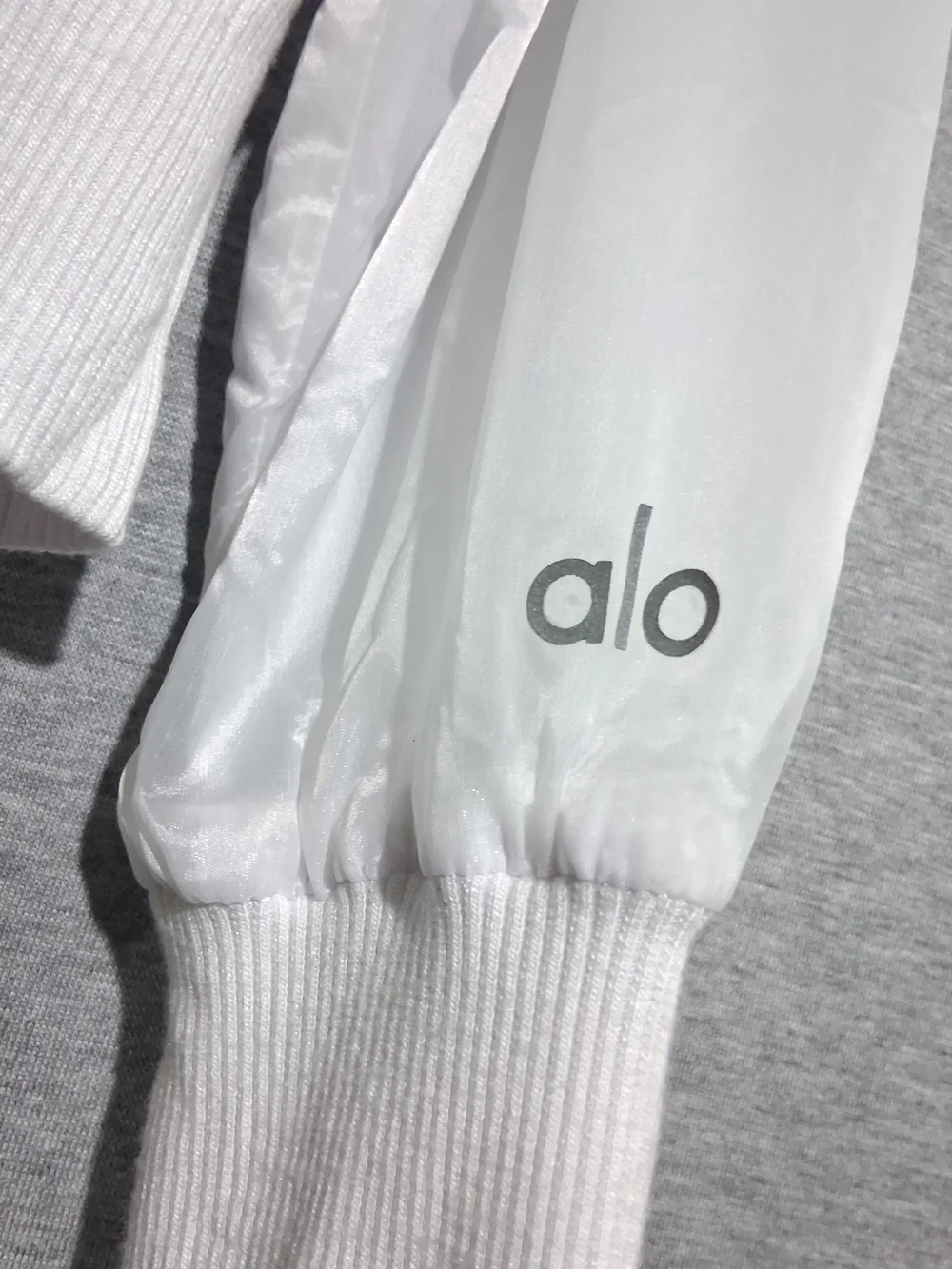 Alo White Hooded Bomber Jacket with Black Contrast Zip